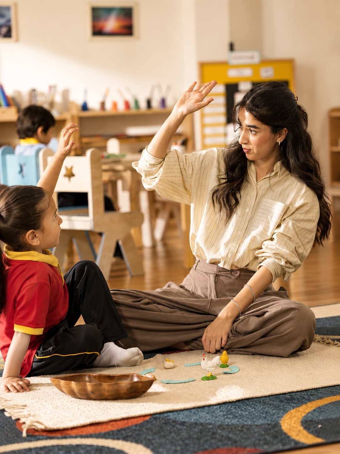 A toddler and parent sharing a moment during an Aster Stars playdate