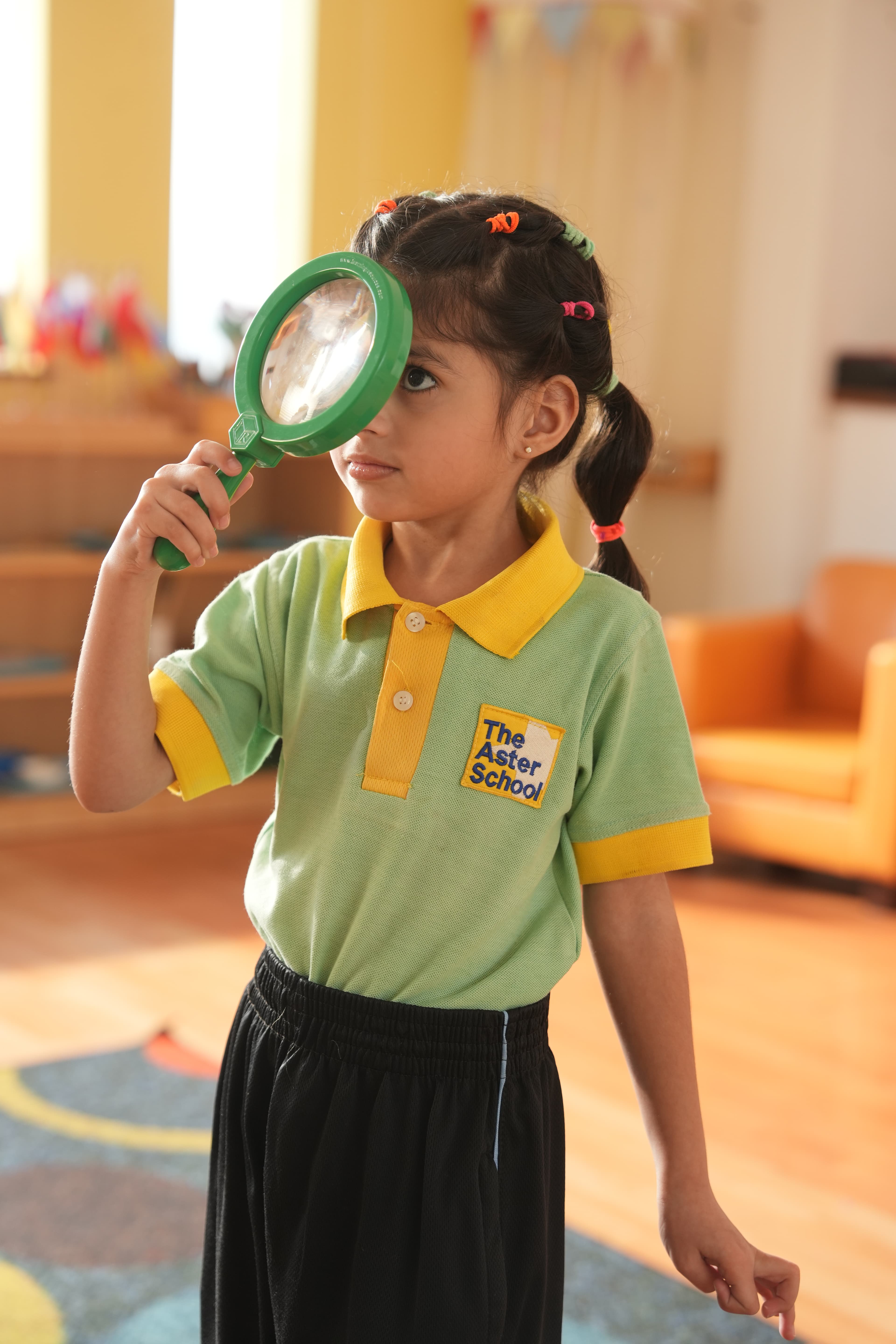 A young explorer using a magnifying glass