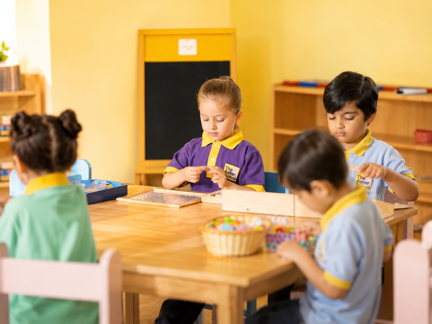An Aster child concentrating on a puzzle in a prepared classroom